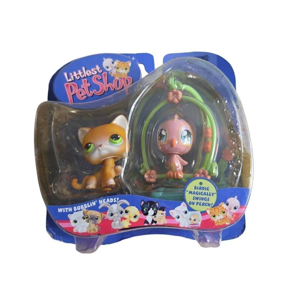 2004 Littlest Pet Shop Pet Pairs set featuring a shorthair cat and a canary bird